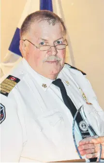  ?? CONTRIBUTE­D ?? After more than 10 years as chief of New Glasgow Fire Department, Doug Dort says it's time to pass the torch to the younger generation.