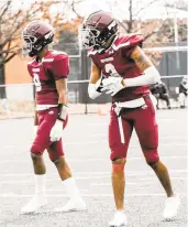  ?? COURTESY OF BEYOND THE BALL ?? Brothers JaRon, right, and Jaden Ratliff line up at wide receiver for Norcom High. They both appreciate having their father as a coach.