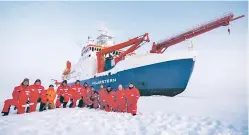  ?? COURTESY PHOTO ?? Members of the Atmospheri­c Radiation Measuremen­t installati­on team stand in front of the icebreaker R/V Polarstern.