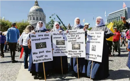  ?? AFP ?? Green message: Singing nuns at the Civic Center Plaza after marching in the ‘Rise For Climate’ global action in San Francisco. —