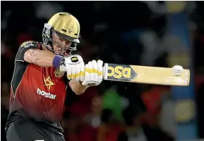  ?? GETTY IMAGES ?? Colin Munro has become the first batsman in the Caribbean Premier League to top 500 runs for the season as his Trinbago Knight Riders defended their title.