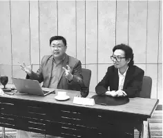  ??  ?? Chan (left) and executive director Tohru Yoshida during the presentati­on of the analysis of iPay88’s 2017 data insights on Monday.
