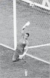  ?? THEMBA HADEBE THE ASSOCIATED PRESS ?? Egypt goalkeeper Essam El Hadary saves a shot during a Group A match against Saudi Arabia at soccer’s World Cup in Volgograd, Russia, on Monday.