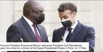 ??  ?? France's President Emmanuel Macron welcomes President Cyril Ramaphosa upon his arrival for a dinner at the Elysee Presidenti­al Palace in Paris, on 17 May.