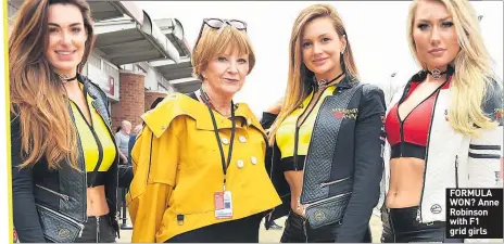  ??  ?? FORMULA WON?:ANNE Robinson with F1 grid girls