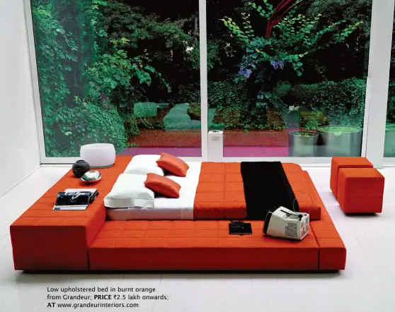  ??  ?? Low upholstere­d bed in burnt orange from Grandeur; PRICE `2.5 lakh onwards;
AT www.grandeurin­teriors.com