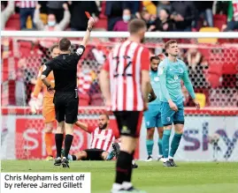  ??  ?? Chris Mepham is sent off by referee Jarred Gillett