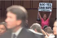  ?? JACK GRUBER/USA TODAY ?? A protester interrupts the hearing for Supreme Court nominee Brett Kavanaugh on Tuesday. Some worry about abortion rights.