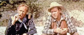  ?? COLUMBIA PICTURES ?? Richard Widmark and James Stewart in “Two Rode Together.”