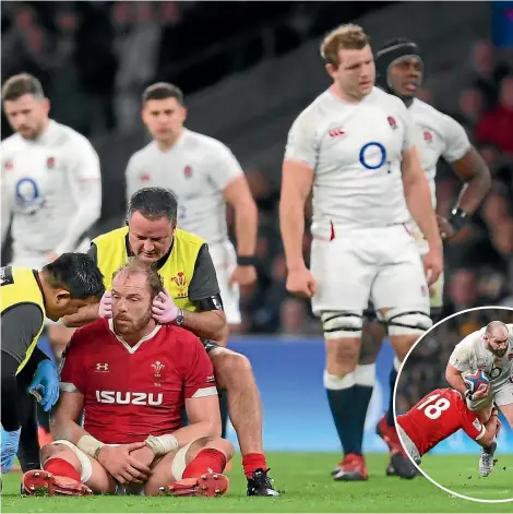  ?? GETTY IMAGES/AP ?? Wales captain Alun Wyn Jones receives treatment during his team’s loss to England at Twickenham. After the match, Jones said he had been grabbed in the groin by England prop Joe Marler, inset.