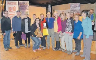  ??  ?? The Rice Krispies Gang raised $6,191.25 for the 16th annual Tely Hike. Heather Halley (holding sign) presented them with the inaugural Gail Sharpe Award for raising the most of any team. The Rice Krispies Gang was the late Gail Sharpe’s team.