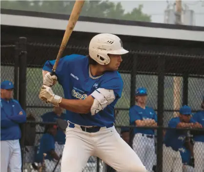  ?? JOSHUA BELL ?? Lake County Corn Dogs player Matt Santana, a 2023 Lake Central graduate, bats during a Northern League game.