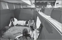  ?? YANG CHENGCHEN / CHINA NEWS SERVICE ?? Displaced residents of Hualien in Taiwan take shelter at Hualien Zhong-Hua Elementary School on Thursday. About 170 people affected by Wednesday’s earthquake now live at temporary emergency shelters at the school.