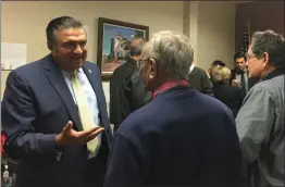  ?? Gina Ender/The Signal ?? Assemblyma­n Dante Acosta chats with a constituen­t during his open house event on Thursday. “We want to make sure people feel connected to me and my staff,” Acosta said.