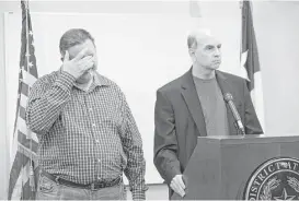  ?? Marie D. De Jesús / Houston Chronicle ?? Brian Lucas, left, the bother of Belinda Lucas Temple who was slain in 1999, allows crime victim’s advocate Andy Kahan to speak on his behalf on Friday.