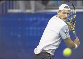  ?? YALONDA M. JAMES/THE COMMERCIAL APPEAL ?? Australia’s Sam Groth eyes the ball during his match against Ukraine’s Illya Marchenko on the first day of the Memphis Open. Marchenko defeated six th-seeded Groth 7- 6 (7-4), 7- 6 (7-2).