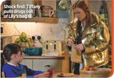  ??  ?? Shock find: Tiffany pulls drugs out of Lily’s bag