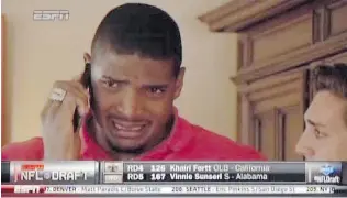  ?? ESPN/ THE ASSOCIATED PRESS ?? In this image taken from video, Missouri defensive end Michael Sam cries as he talks on a mobile phone at a draft party in San Diego, after he was selected in the seventh round, 249th overall . Sam said in an interview that he thought he should have...