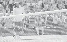  ?? — Gambar AFP ?? SATU KELEGAAN: Serena ceria selepas berjaya melangkah ke peringkat separuh akhir kejohanan Wimbledon di London, England kelmarin.