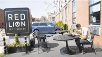  ?? KATHY WILLENS/AP ?? New York Mets minor league pitcher Gary Cornish eats his breakfast in the parking lot of the Red Lion Inn & Suites in New York, where he and the other members of his team stayed in 2016 when the team was not traveling.