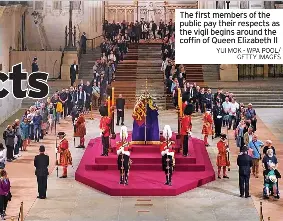  ?? YUI MOK - WPA POOL/ GETTY IMAGES ?? The first members of the public pay their respects as the vigil begins around the coffin of Queen Elizabeth II