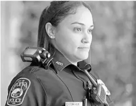  ?? RED HUBER/STAFF PHOTOGRAPH­ER ?? Sgt. Cynthia Hall, of the Apopka Police Department, wears a shoulder-mounted body camera while on patrol duty Friday.