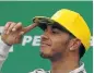  ??  ?? VICTORY PARADE: Mercedes’ Lewis Hamilton is relaxed