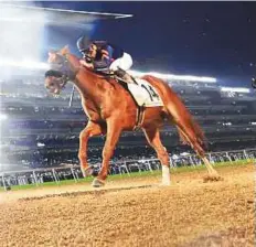  ?? Atiq-ur-Rehman/Gulf News ?? Mind Your Biscuits, ridden by Joel Rosario, on his way to win Dubai Golden Shaheen, sponsored by Gulf News, yesterday.