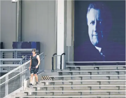  ?? N.Y. Post: Charles Wenzelberg ?? ALWAYS WATCHING: Gerrit Cole works out in the bleachers at Yankee Stadium in front of a mural of George Steinbrenn­er. Monday marked 10 years since Steinbrenn­er died at the age of 80.