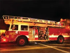  ?? File photo ?? The lighted Christmas Parade in Bishop has establishe­d itself as a tradition in the last few years, featuring the bedecked Bishop Volunteer Fire Department engine escorting Santa Claus himself. This year’s parade is set for Saturday, Dec. 3 on Main Street in Bishop.