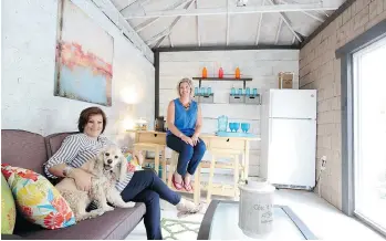  ?? JEAN LEVAC/OTTAWA CITIZEN ?? Designer Kristi Blok, left, created a she shed out of a backyard garden shed for her sister, Lynsey Bennett.