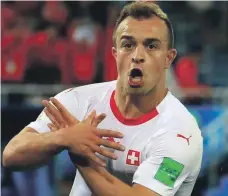  ??  ?? Xherdan Shaqiri made a gesture that symbolises the Albanian flag after scoring against Serbia at the World Cup Reuters