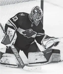  ?? DAVID BERDING/USA TODAY SPORTS ?? Minnesota Wild goaltender Cam Talbot makes a save against the Tampa Bay Lightning on Sunday.