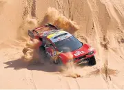  ?? AFP ?? Sebastien Loeb and co-driver Fabian Lurquin compete in the seventh stage of the 2022 Dakar Rally.