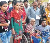  ?? MUJEEB FARUQUI/HT PHOTO ?? 109yearold Chintamani Vaghela shows her identity card as she arrives to vote in Bhopal on Wednesday.