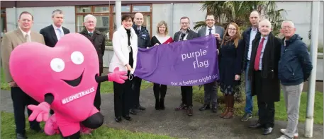  ??  ?? Mayor of Tralee Norma Foley had the honour of raising the Purple Flag at Princes Quay on Thursday with members of Kerry County Council, Tralee Chamber Alliance. Included are: Cllr Tom McEllistri­m, Cllr Pat Daly, Cllr Pat McCarthy, Cllr Sam Locke, Sgt...