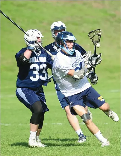  ?? Photos by Ernest A. Brown ?? Burrillvil­le junior middie Adam Keach (20, above) scored a goal with 2:51 left in Friday’s game against Westerly to cut the Broncos’ deficit to just one goal. Even though junior goalie Josh Newell (15, below) made 15 saves in a 6-5 Division II loss.