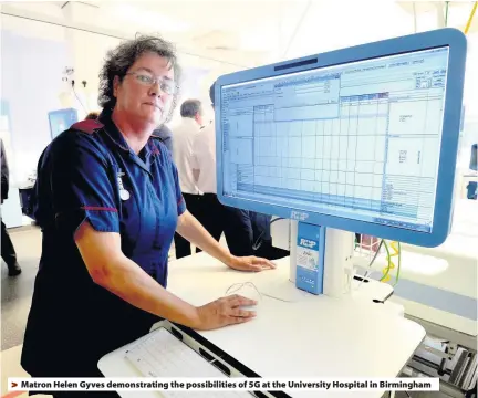  ??  ?? > Matron Helen Gyves demonstrat­ing the possibilit­ies of 5G at the University Hospital in Birmingham