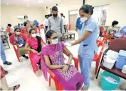  ??  ?? Special vaccinatio­n camp for students under way at Nandanam Arts College on Saturday