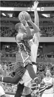  ?? STEPHEN M. DOWELL/STAFF PHOTOGRAPH­ER ?? Tobias Harris had 17 points and 10 rebounds in the Magic’s 100-91 victory at Amway Center on Wednesday night.