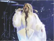  ?? AP PHOTOA/CHRIS PIZZELLO ?? Bebe Rexha performs at the iHeartRadi­o Jingle Ball in Los Angeles.