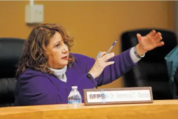  ?? LUIS SÁNCHEZ SATURNO/THE NEW MEXICAN ?? Superinten­dent Veronica García speaks at a school board meeting last week. García says she is ‘open’ to staying on at least a year beyond her current contract, which ends in June 2019.