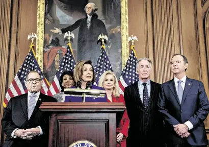  ?? Andrew Harrer / Bloomberg ?? House Speaker Nancy Pelosi announces the next steps in the impeachmen­t inquiry as she is joined by Reps. Jerry Nadler, from left, Maxine Waters, Carolyn Maloney, Richard Neal and Adam Schiff on Tuesday at the U.S Capitol.