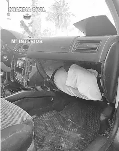  ??  ?? An African migrant hidden in the dashboard of a car that forced a frontier post between Morocco and the Spanish enclave of Melilla. —AFP photo