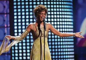  ?? Associated Press file photo ?? Eight years after her death, Whitney Houston still has the bestsellin­g gospel album by a Black woman, “The Preacher’sWife,” which she recorded in 1996.