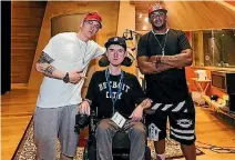  ??  ?? Wheelchair rapper Joe Ward met internatio­nal rap star Eminem during his recent trip to Detroit.