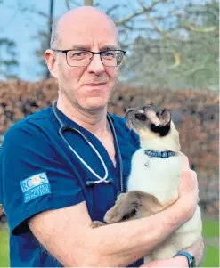  ??  ?? Alan Hill, director of Dundee and Angus-based Parkside Vet Group Ltd, says there is “no evidence that cats and dogs are involved in the transmissi­on” of Covid-19. However, he says it is important owners wash their hands after handling or feeding pets and maintain good hygiene.