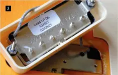  ??  ?? 3 3. The patent number is stamped on the pickup base, while the sticker tells us this is the bridge pickup