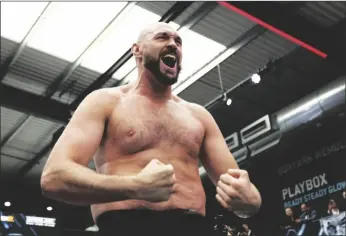  ?? IAN WALTON/AP ?? British boxer Tyson Fury attends an open workout for the media and fans at Wembley’s Boxpark in London on Tuesday.