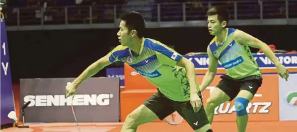  ??  ?? Malaysia’s national doubles pair of Goh V. Shem (left) and Tan Wee Kiong.